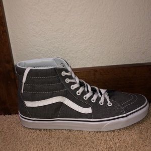 A pair of 10.5 men’s High top Vans